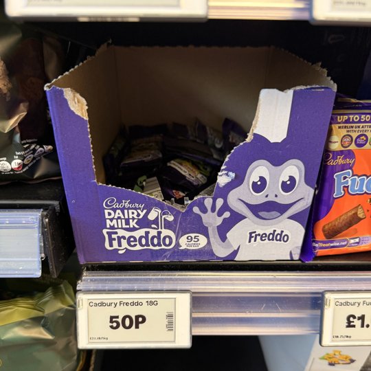 Cadbury Freddo 18G shelf label showing 50P beneath the Freddo display.